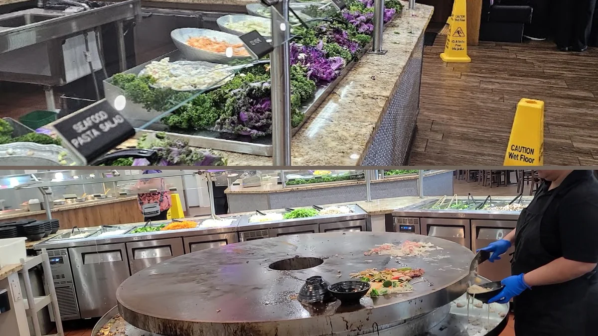 Buffet counters with trays of hot food