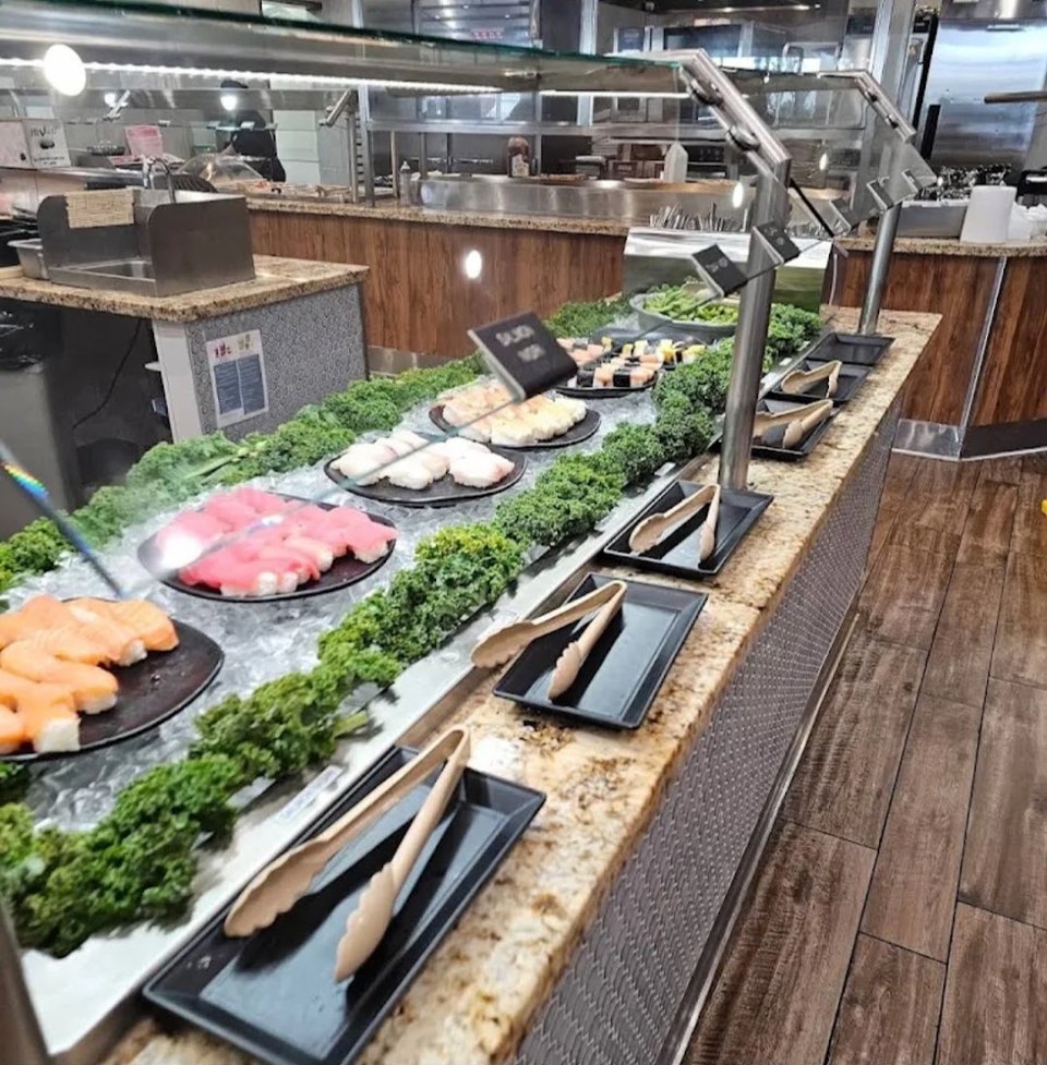 Casual restaurant seating near the serving line